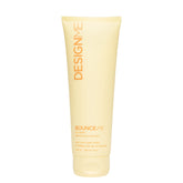 Design.Me BOUNCE.ME bottle pour shows easy application for defined curls.
