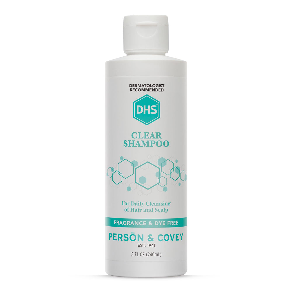 DHS Clear Shampoo bottle closeup showing unscented formula for sensitive skin.