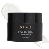 DIME Beauty Dewy Day Cream bottle featuring rosehip oil for deep hydration.