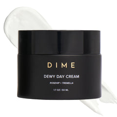 DIME Beauty Dewy Day Cream bottle featuring rosehip oil for deep hydration.