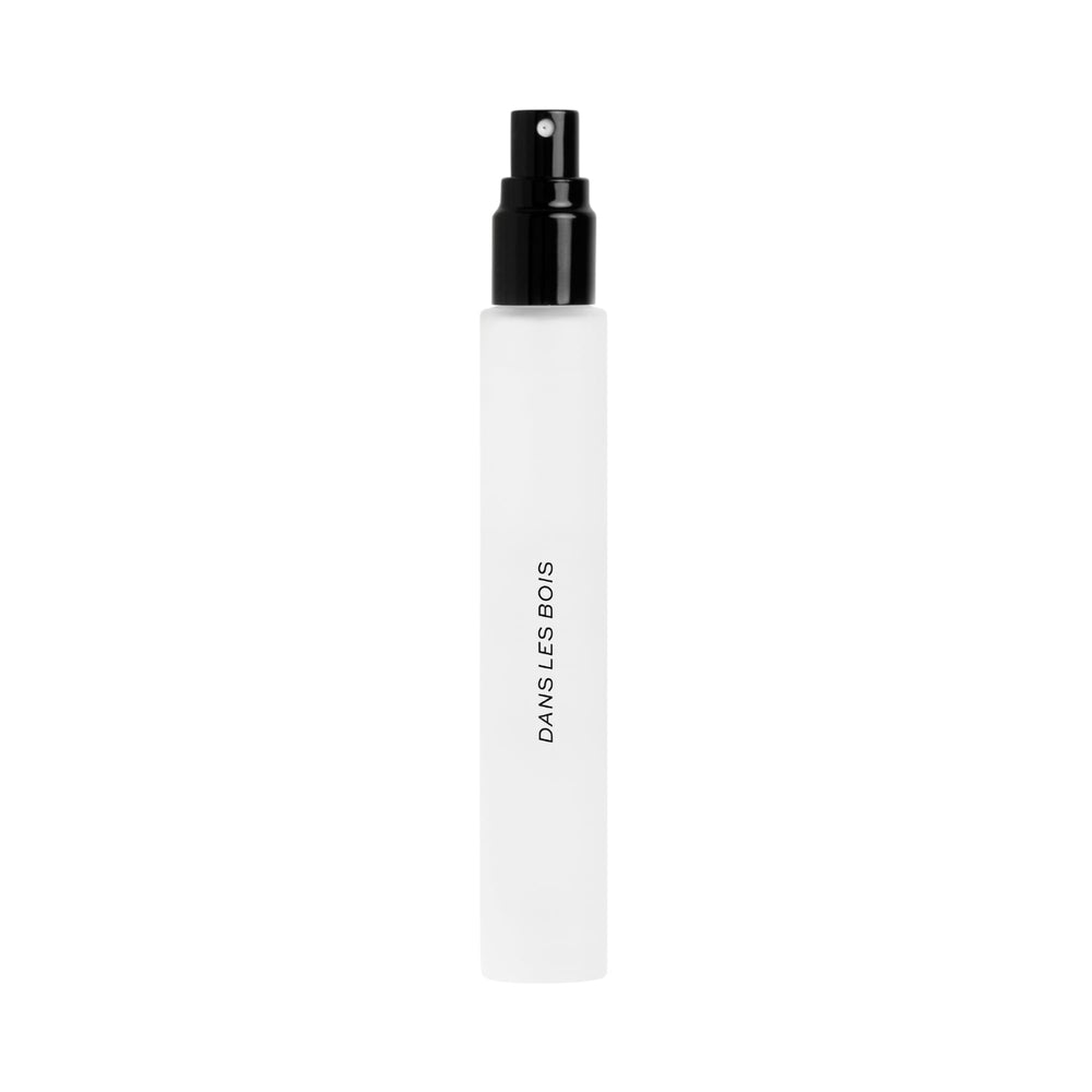 DIME Beauty Dans Les Bois bottle portrait showcases bold woody-floral scent for daily elegance.
