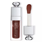 Dior Addict Lip Glow Oil 020 Mahogany closeup highlights rich tint and nourishing shine.