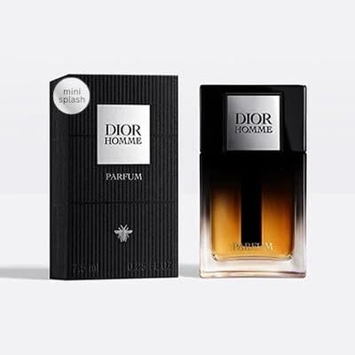 Dior Homme Parfum bottle splash highlighting woody amber notes for a lasting scent.