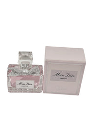 Dior Mini Parfum dabber applicator allows precise splash application.