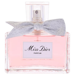 Miss Dior by Dior bottle cap closeup highlights refined detailing and luxury.