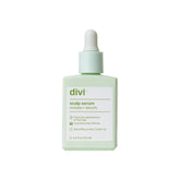 Divi Scalp Serum bottle close-up highlights nourishing formula for healthier scalp and fuller-looking hair
