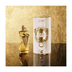 Divine by Jean Paul Gaultier bottle close-up label, luxe amber floral profile for confident presence.