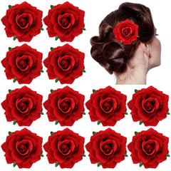 Dizila flamenco red rose brooch enhances a wedding outfit with romantic detail.