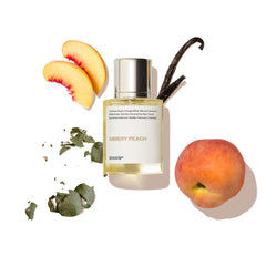 Dossier Ambery Peach bottle front shows modern design for daily wear.