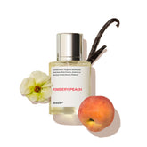 Dossier Powdery Peach bottle close-up for everyday elegant fragrance.