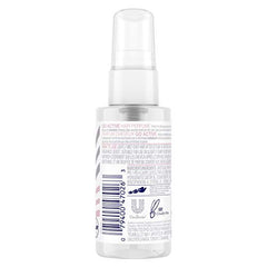 Dove Care Between Washes hair perfume travel-size bottle for quick on-the-go refresh.