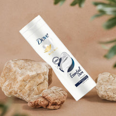 Dove Essential Nourishment Body Lotion dry-skin application for rapid absorption.