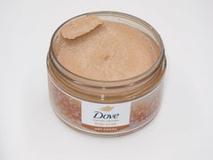 Dove Hot Cocoa Body Scrub close-up shows exfoliating texture for gentle polish.