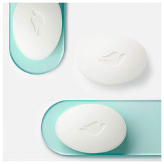 Dove unscented bath bar closeup texture, mild cleanse for delicate skin.