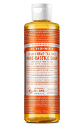Dr. Bronner's Castile Liquid Soap Tea Tree bottle being poured for versatile cleaning