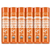 Dr. Bronner’s Organic Lip Balm Orange Ginger application on lips delivers lasting moisture.