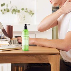 Dr. Bronner's Lotion being rubbed into hands for quick absorption and softness.