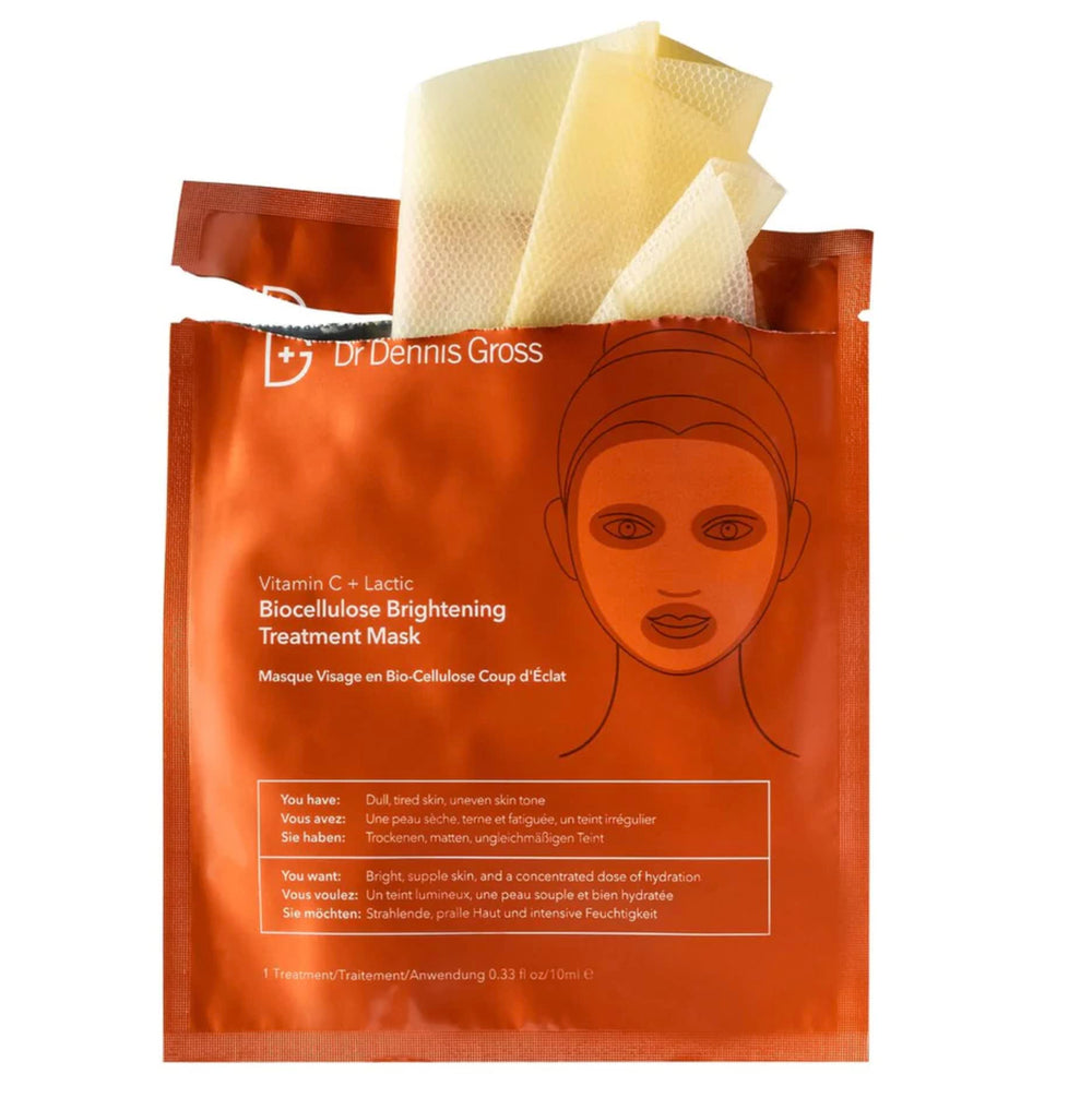 Dr Dennis Gross Vitamin C Lactic Biocellulose Brightening Mask application closeup for hydrated, radiant skin
