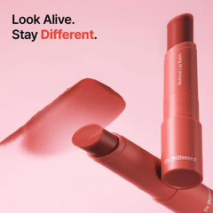 Dr.Different retinal lip balm tinted swatches reveal subtle color and shine.
