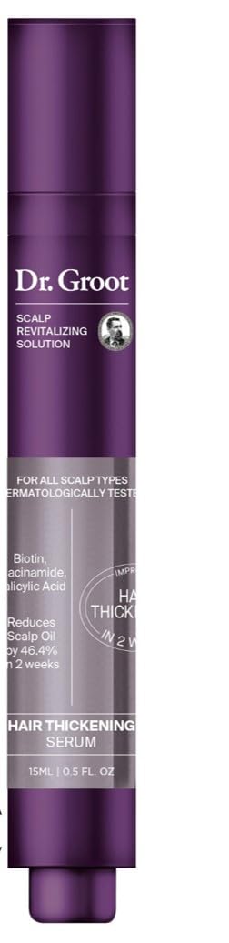 Dr. Groot award-winning serum bottle close-up demonstrates precise roll-on for targeted scalp care.