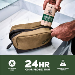 Dr. Squatch Pine Tar deodorant stick during application for fresh confidence