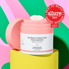 Drunk Elephant Bora Barrier Repair Cream jar side shows clean clinical skincare promise.