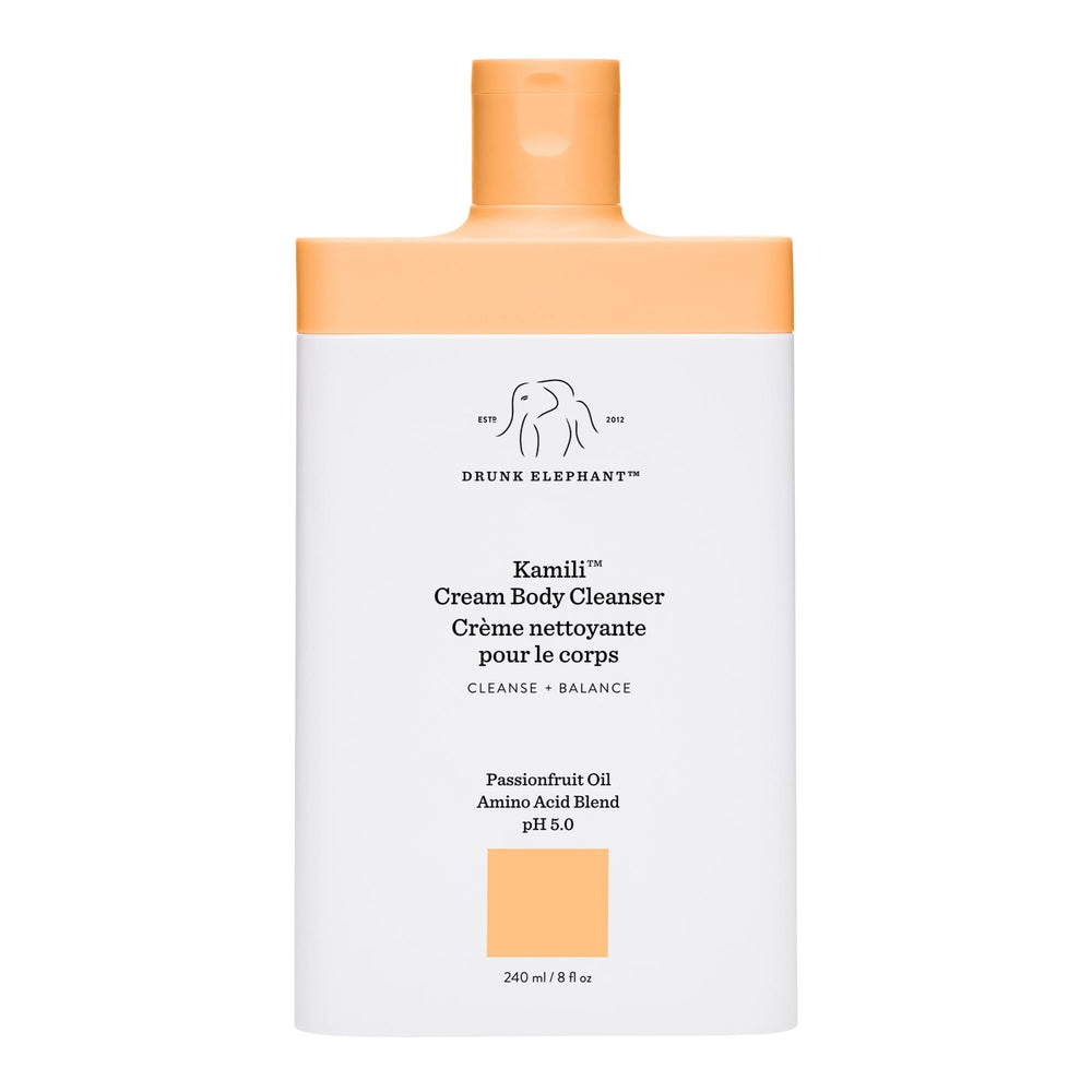 Drunk Elephant Kamili Cream Body Cleanser bottle closeup shows gentle cleansing for sensitive skin.