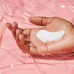 Drunk Elephant Sili Body Lotion close-up showing lightweight cream texture for smooth skin.