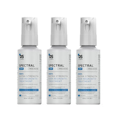 DS Laboratories Spectral.UHP bottle close-up shows high-strength minoxidil formula for fuller look.