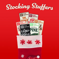 Duke Cannon Holiday Variety Pack 3-pack shown as a festive gift-ready set.
