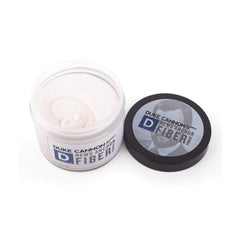 Duke Cannon News Anchor Fiber Pomade hair texture with natural matte finish.