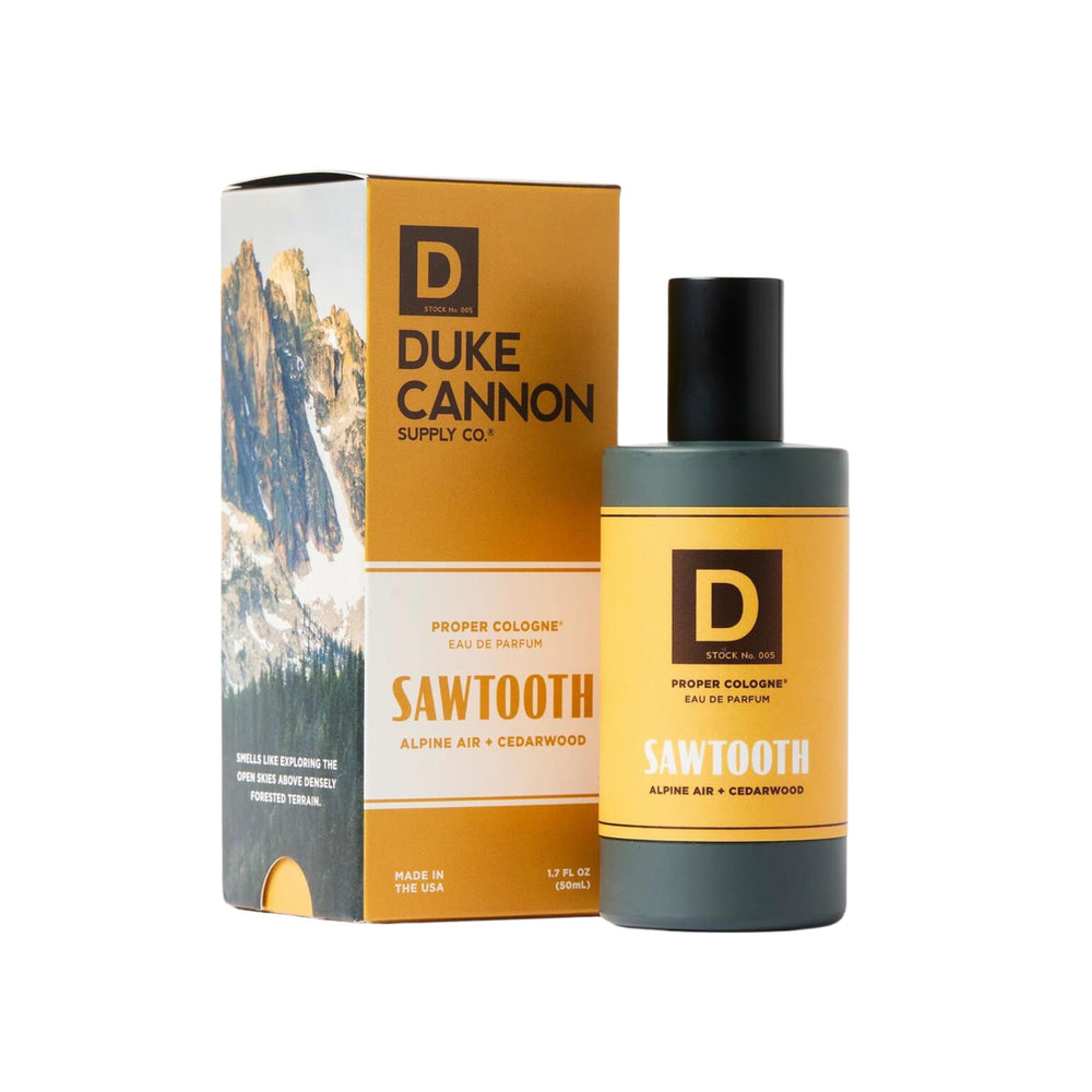 Duke Cannon Proper Cologne Sawtooth bottle closeup shows alpine cedarwood notes for everyday confidence