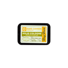 Duke Cannon solid cologne with cedarwood note offering rugged depth.