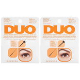 DUO Brush-On Strip Lash Adhesive dark tone close-up shows precise lash application