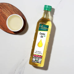 Dwaraka castor oil pour/spout image for easy DIY blends and massage.