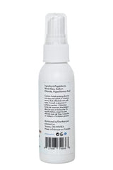 e11ement hypochlorous cleanser bottle on bathroom shelf beside towels for daily toning.