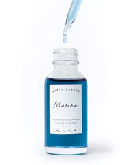 Earth Harbor Marina bottle on vanity suggests daily-use for even-toned, luminous skin.