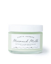 Earth Harbor Mermaid Milk bottle closeup demonstrates hydrating, lightweight skincare
