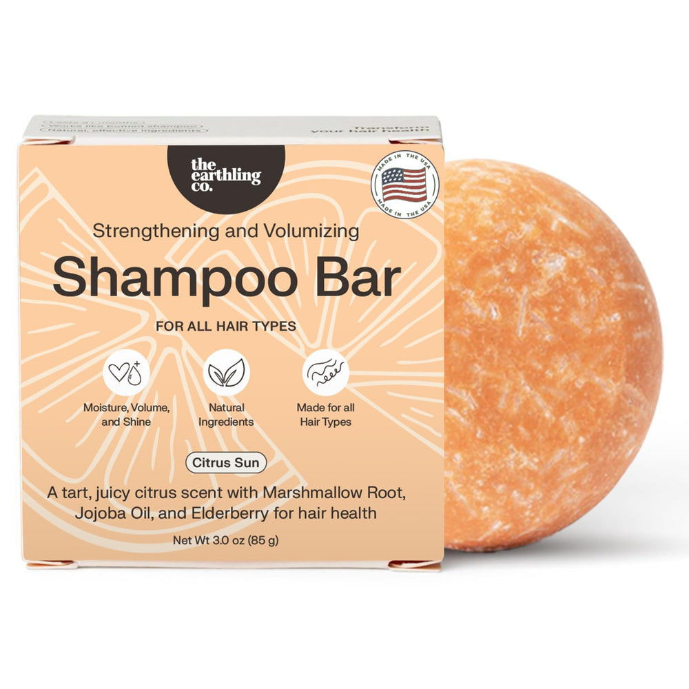 The Earthling Co shampoo bar front view with compact eco packaging for sustainable cleansing