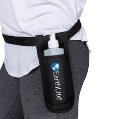EarthLite massage bottle holster on waistband for quick tableside access.