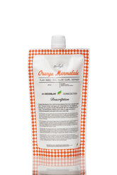 Ecoslay Orange Marmalade bottle close-up for long-lasting curl hold.