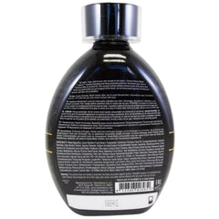 ED HARDY Coconut Kisses Black Label lotion application on skin for bronze glow and hydration.