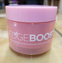 EDGEBOOSTER Style Factor pomade texture scoop showing moisture-rich formula