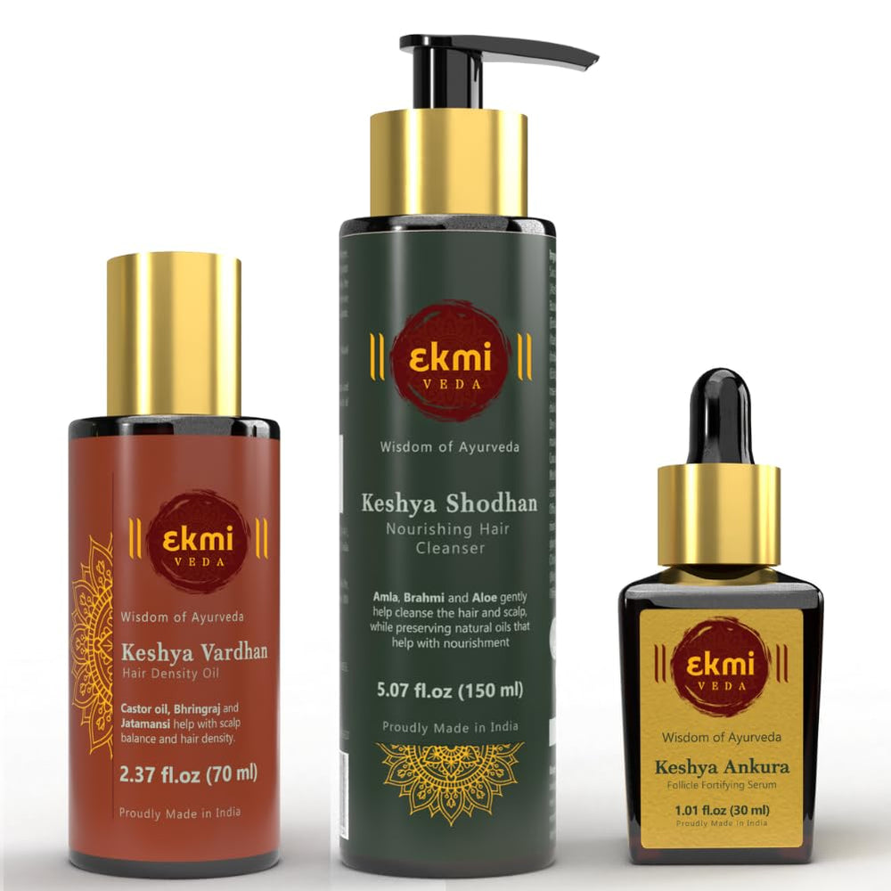EKMIVEDA hair growth oil bottle—nourishing scalp with castor and Brahmi oils.