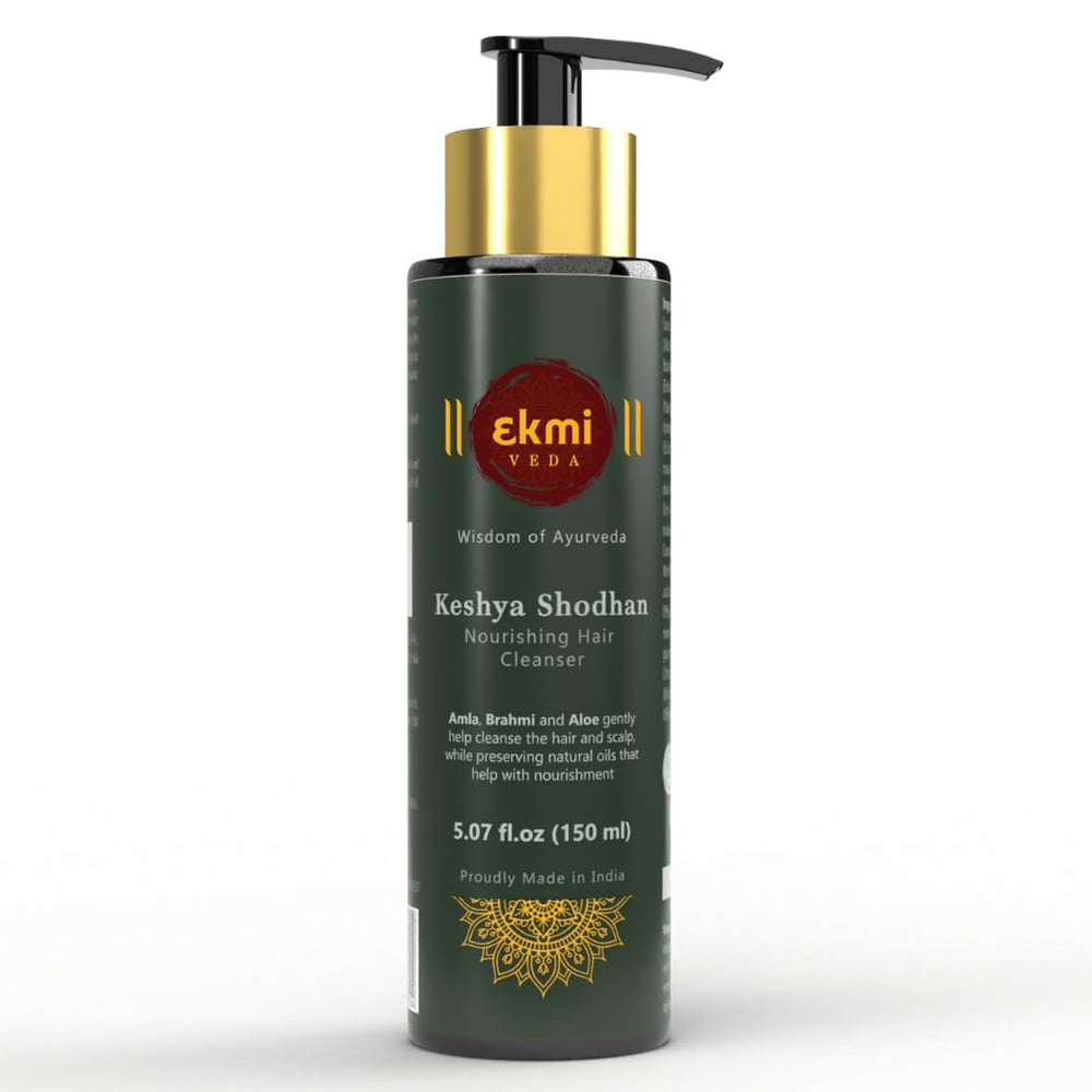 EKMIVEDA Keshya Shodhan shampoo bottle shows rosemary infusion for a healthier scalp.
