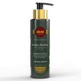 EKMIVEDA Keshya Shodhan shampoo bottle shows rosemary infusion for a healthier scalp.