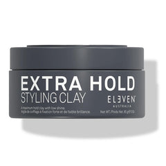 ELEVEN AUSTRALIA Extra Hold Styling Clay bottle on display shows long-lasting hold.