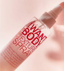 Application of ELEVEN AUSTRALIA I Want Body Texture Spray on hair for root-to-end texture