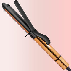 ELLA BELLA Curling Iron 1-inch barrel with digital display for precise styling.