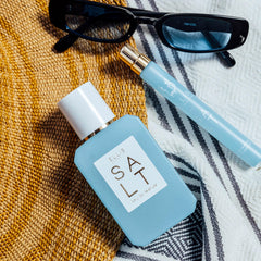 Ellis Brooklyn Salt EDP amber hue bottle, evokes sun-drenched warmth and tropical vibes.